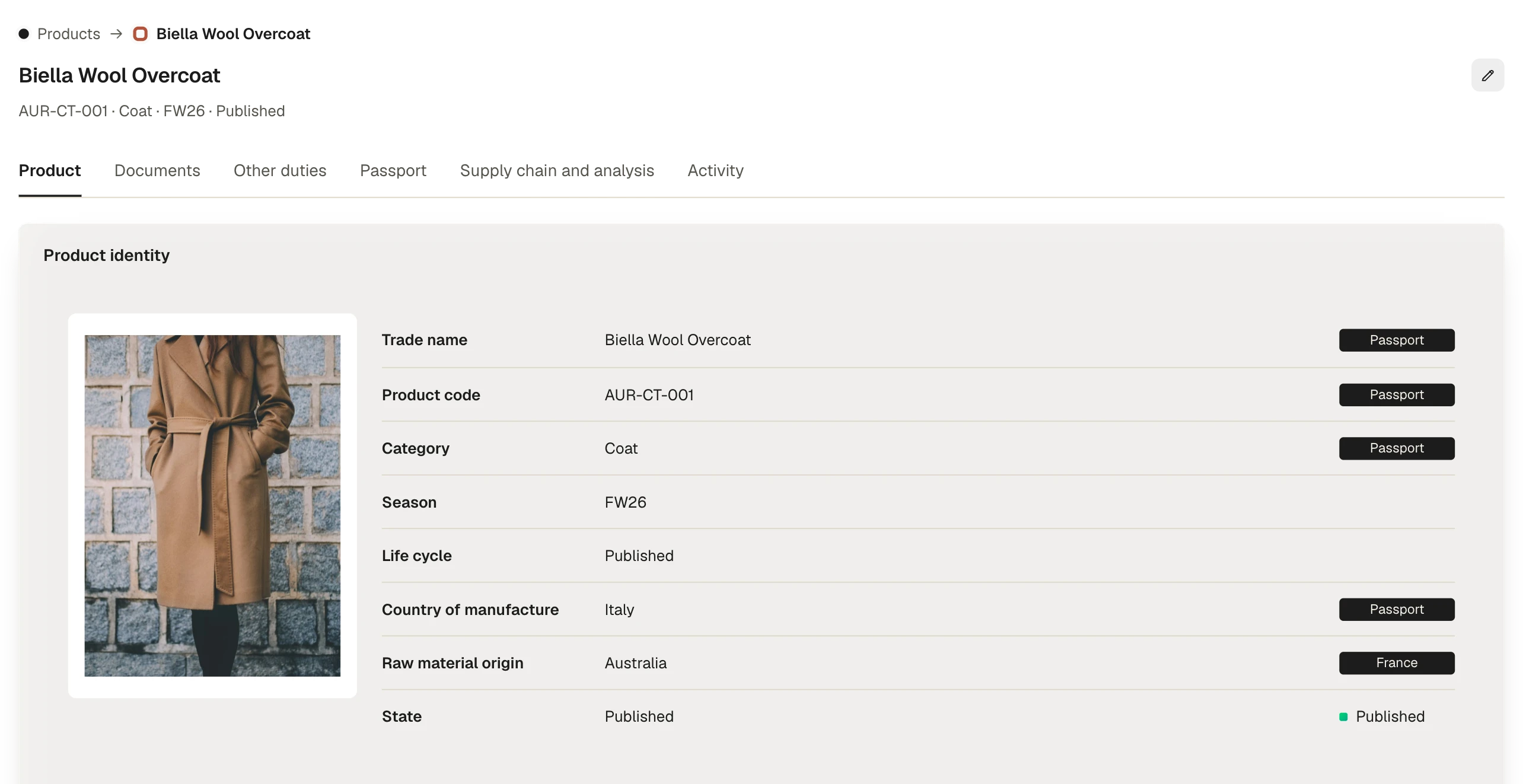 Product page in the platform: identity of a wool overcoat, with its tabs for documents, passport and supply chain